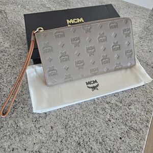 MCM Gray Embossed Leather Wristlet Clutch . New With Box & Dust Bag Inc.